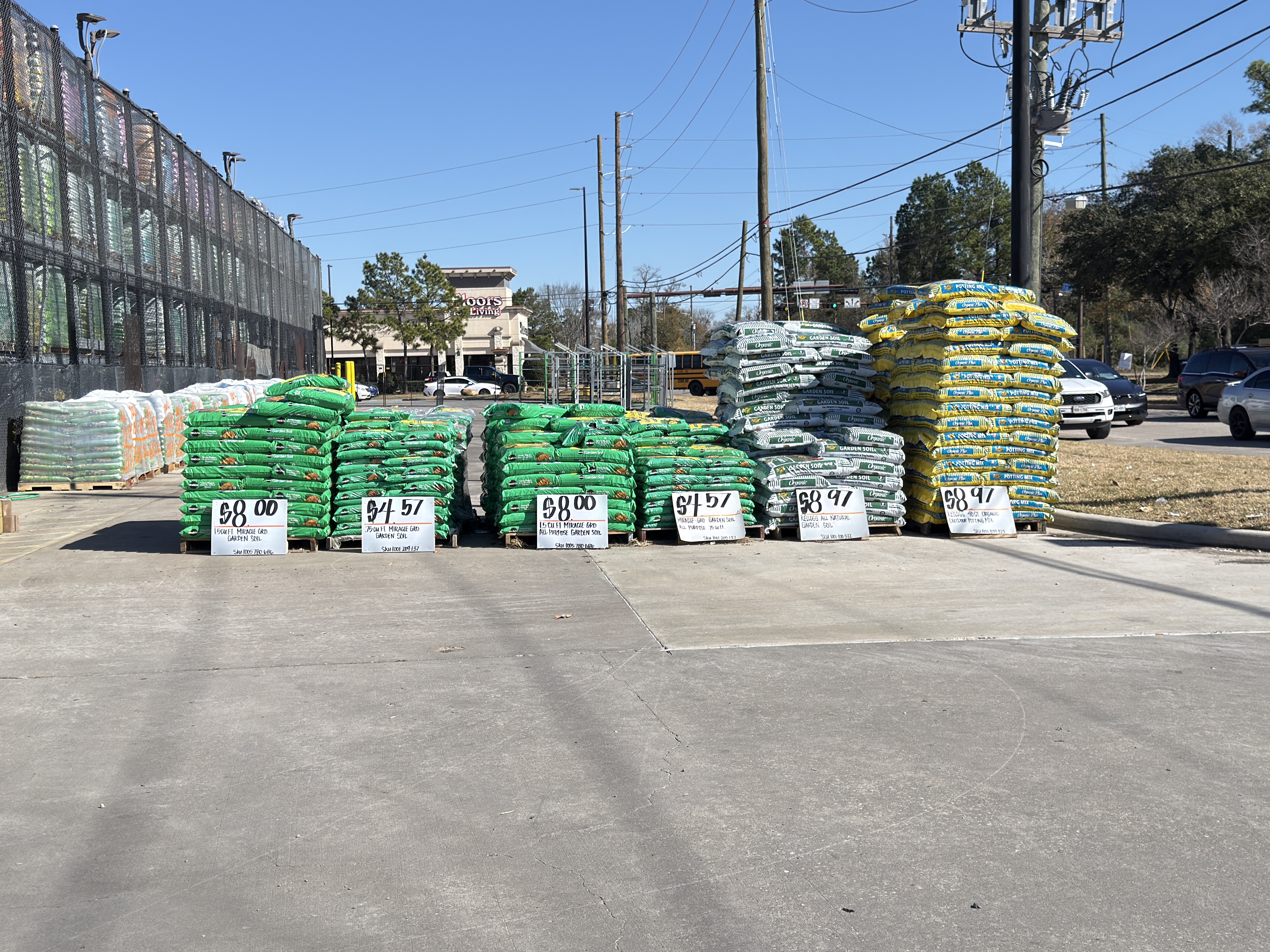 Pallets of bagged landscape materials at a big box store